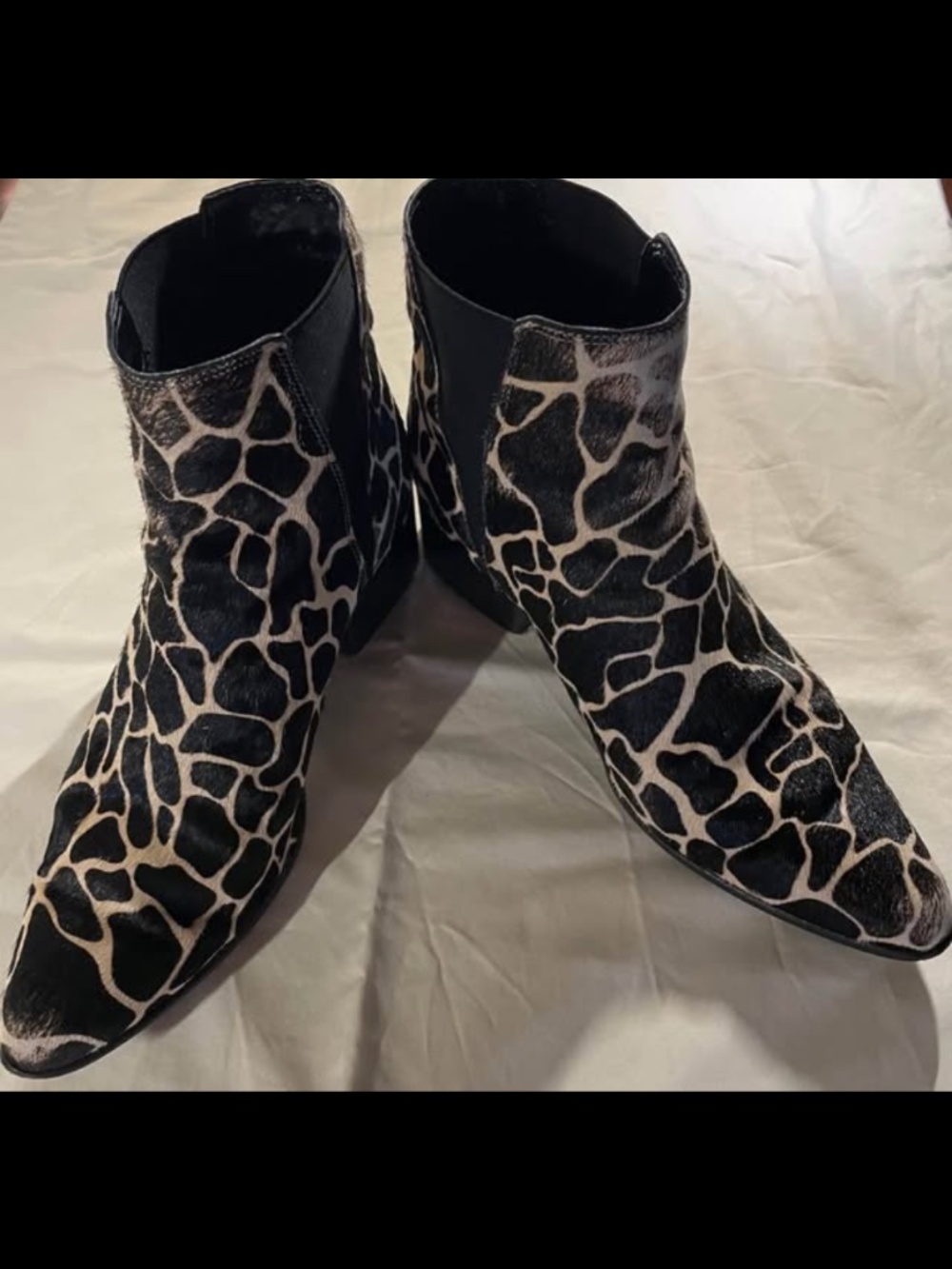 Urban Outfitters Giraffe Pattern size 8 boots